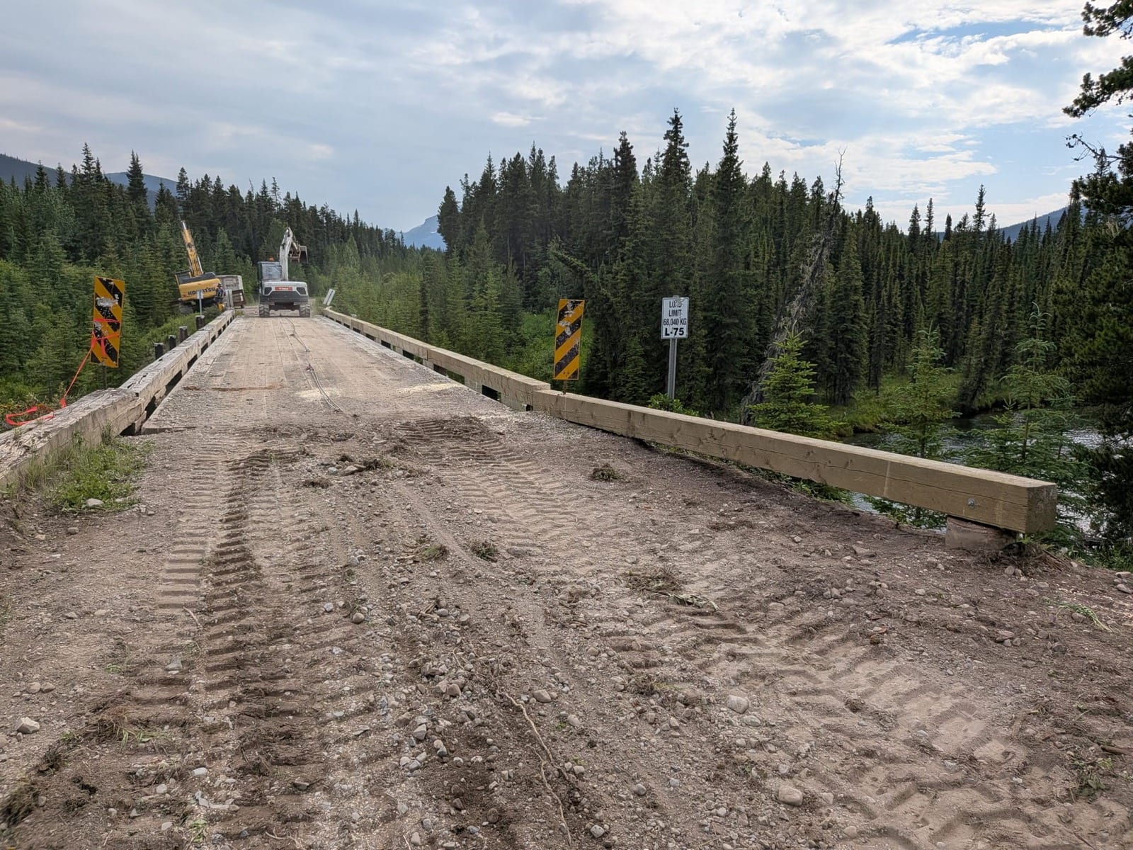 Full deck view of the 2500 Road bridge with new timber guardrails